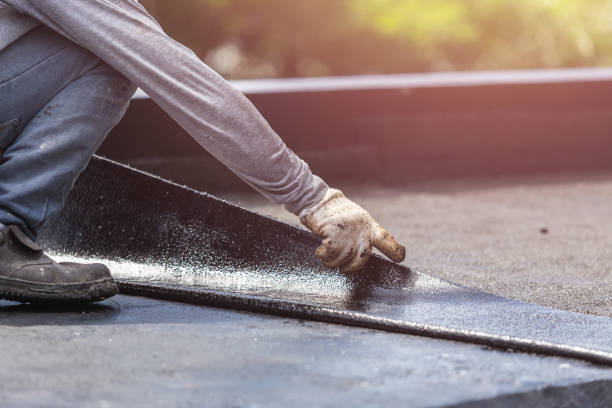 Professional Emergency Waterproofing technician working in Akron, PA